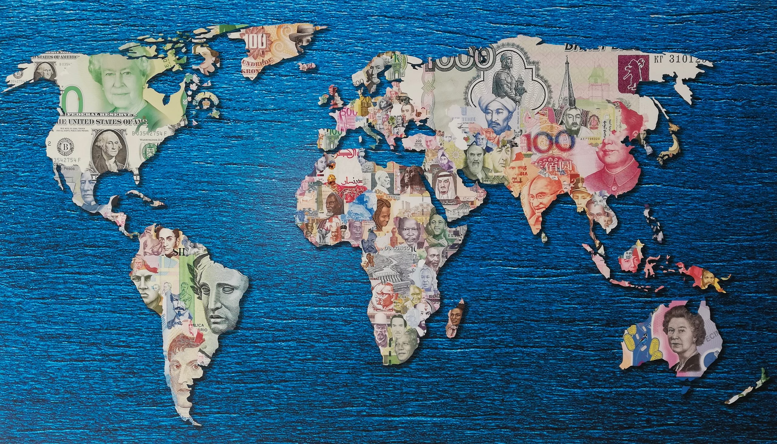 World,Map,With,Continents,Made,From,Money,Of,Different,Countries
